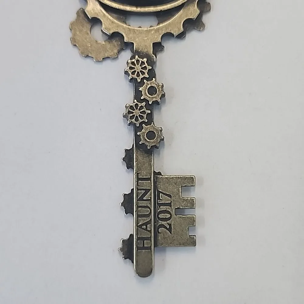WORLDS OF FUN KEYCHAIN KEYRING HAUNT 2017 AMUSEMENT PARK RIDES STEAMPUNK
